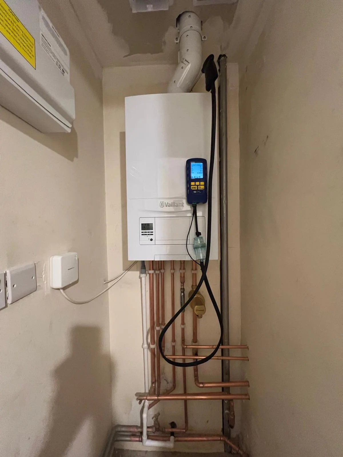 New high-efficiency Vaillant boiler installed with clean pipework